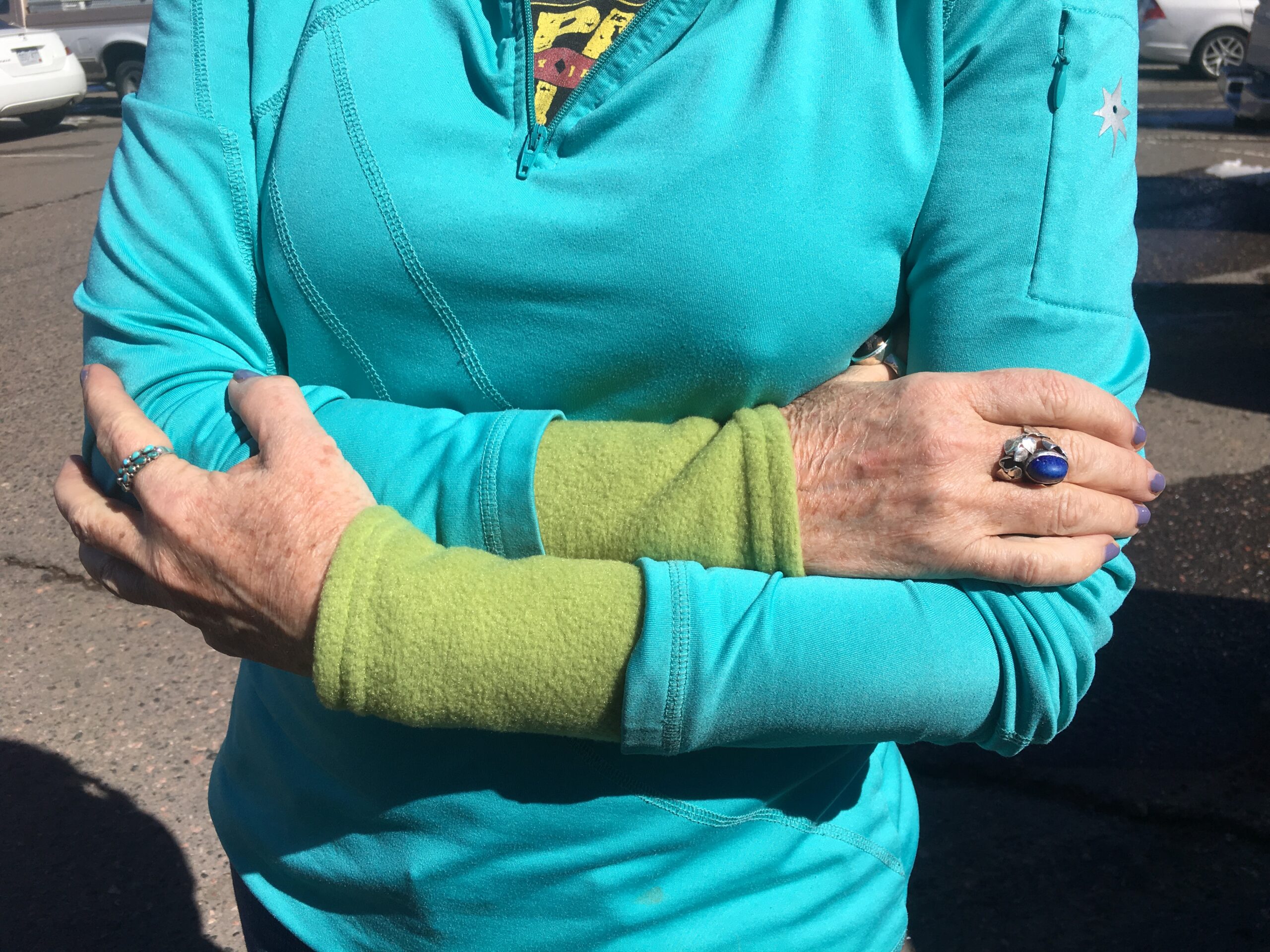 Gallery of Wrist Warmer green picture of wrist warmers women in blue bloused with green pair on